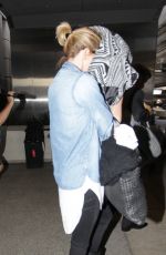 CHARLIZE THERON and Sean Penn Arrives at LAX Airport