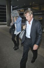 CHARLIZE THERON and Sean Penn Arrives at LAX Airport