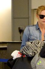 CHARLIZE THERON and Sean Penn Arrives at LAX Airport