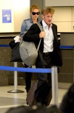 CHARLIZE THERON and Sean Penn Arrives at LAX Airport