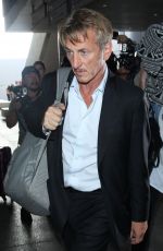 CHARLIZE THERON and Sean Penn Arrives at LAX Airport