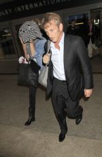CHARLIZE THERON and Sean Penn Arrives at LAX Airport
