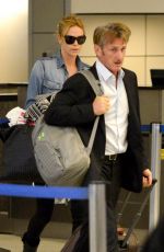 CHARLIZE THERON and Sean Penn Arrives at LAX Airport