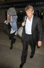 CHARLIZE THERON and Sean Penn Arrives at LAX Airport