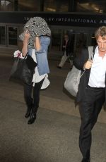 CHARLIZE THERON and Sean Penn Arrives at LAX Airport