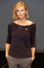 CHARLIZE THERON at Unaids New Fast Track Report Launch in Los Angeles