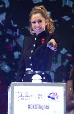 CHERYL COLE Switches Oxford street Christmas Lights in London