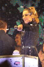 CHERYL COLE Switches Oxford street Christmas Lights in London