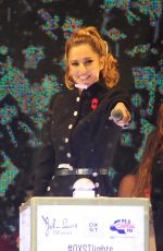 CHERYL COLE Switches Oxford street Christmas Lights in London