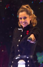 CHERYL COLE Switches Oxford street Christmas Lights in London
