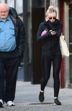 DAKOTA FANNING in Tights Out and About in New York