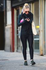 DAKOTA FANNING in Tights Out and About in New York