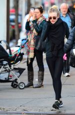 DAKOTA FANNING in Tights Out and About in New York