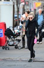 DAKOTA FANNING in Tights Out and About in New York