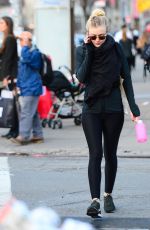 DAKOTA FANNING in Tights Out and About in New York