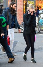 DAKOTA FANNING in Tights Out and About in New York