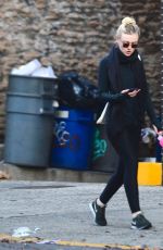 DAKOTA FANNING in Tights Out and About in New York