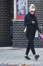 DAKOTA FANNING in Tights Out and About in New York