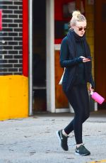 DAKOTA FANNING in Tights Out and About in New York