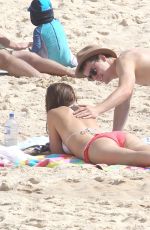 DEMI HARMAN and Alec Snow at a Beach in Sydney