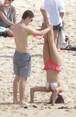 DEMI HARMAN and Alec Snow at a Beach in Sydney