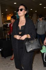 DEMI LOVATO Arrives at Heathrow Airport in london 1111