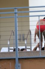 EVA LONGORIA in Bikini at a Pool in Miami 2411