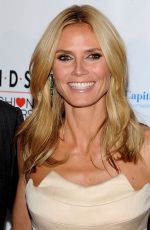 HEIDI KLUM at 2014 K.I.D.S./Fashion Delivers Gala in New York