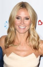 HEIDI KLUM at 2014 K.I.D.S./Fashion Delivers Gala in New York