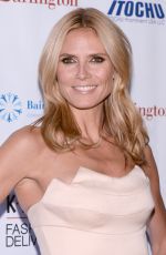 HEIDI KLUM at 2014 K.I.D.S./Fashion Delivers Gala in New York