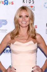 HEIDI KLUM at 2014 K.I.D.S./Fashion Delivers Gala in New York