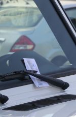 HILARY DUFF Gets a Parking Ticket in West Hollywood