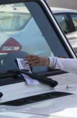 HILARY DUFF Gets a Parking Ticket in West Hollywood