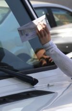 HILARY DUFF Gets a Parking Ticket in West Hollywood