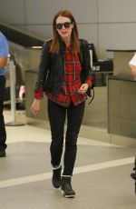 JULIENNA MOORE Arrives at Los Angeles International Airport