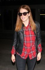 JULIENNA MOORE Arrives at Los Angeles International Airport