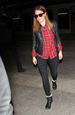 JULIENNA MOORE Arrives at Los Angeles International Airport
