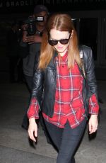 JULIENNA MOORE Arrives at Los Angeles International Airport