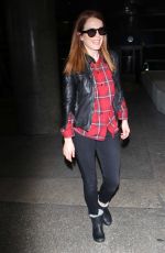 JULIENNA MOORE Arrives at Los Angeles International Airport