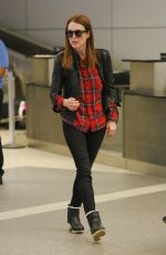 JULIENNA MOORE Arrives at Los Angeles International Airport