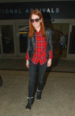 JULIENNA MOORE Arrives at Los Angeles International Airport