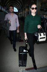 KATE UPTON Arrives at Los Angeles International Airport 1611