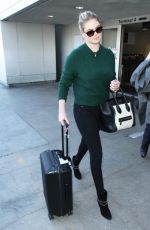 KATE UPTON Arrives at Los Angeles International Airport 1611