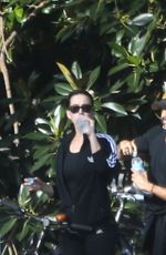 KATY PERRY in Tights Riding a Bicycle Out in Perth
