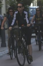 KATY PERRY in Tights Riding a Bicycle Out in Perth