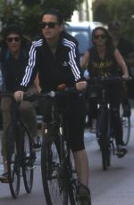 KATY PERRY in Tights Riding a Bicycle Out in Perth