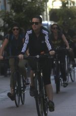 KATY PERRY in Tights Riding a Bicycle Out in Perth