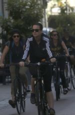 KATY PERRY in Tights Riding a Bicycle Out in Perth