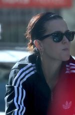 KATY PERRY in Tights Riding a Bicycle Out in Perth