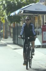 KATY PERRY in Tights Riding a Bicycle Out in Perth